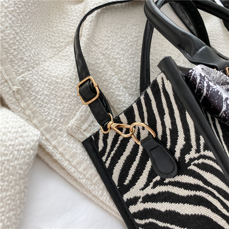 04742ee8 57bd 49c2 b2ce e8a101c1891c - Autumn And Winter Large-Capacity Zebra Print Silk Scarf Decoration Handbag