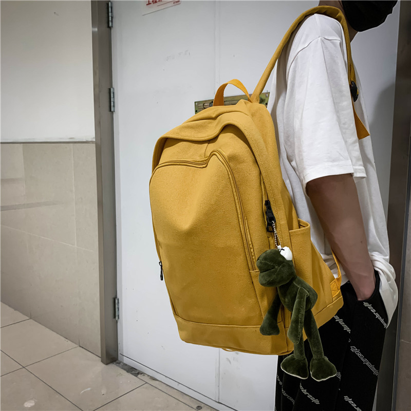 0955f4cc ee75 4ff5 bada 3b092e8de5f2 - Men And Women Through The Use Of Solid Color Canvas Environmentally Friendly Hanging Backpack