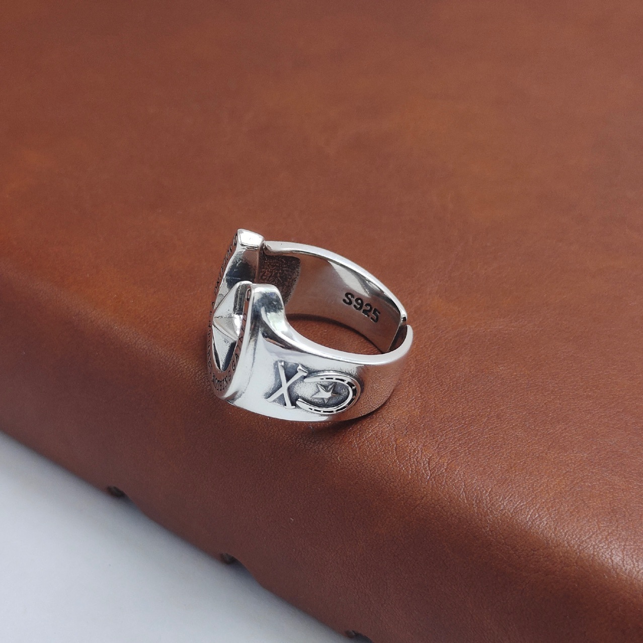 Close-Up of the Star Symbol on the Men's Silver Ring