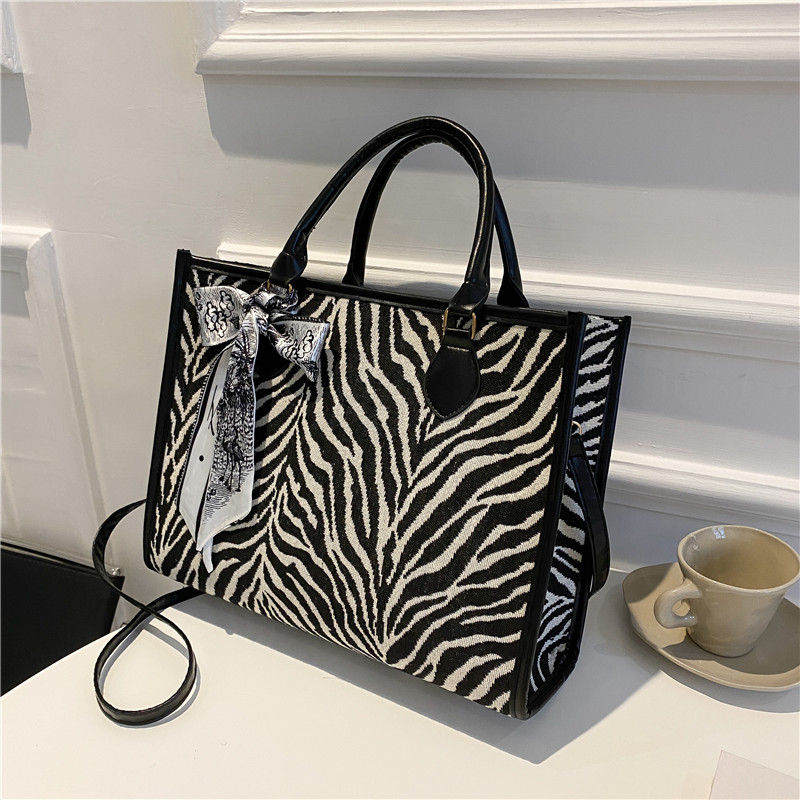 14a875f5 07c6 4207 a7a9 267e8cadb17c - Autumn And Winter Large-Capacity Zebra Print Silk Scarf Decoration Handbag