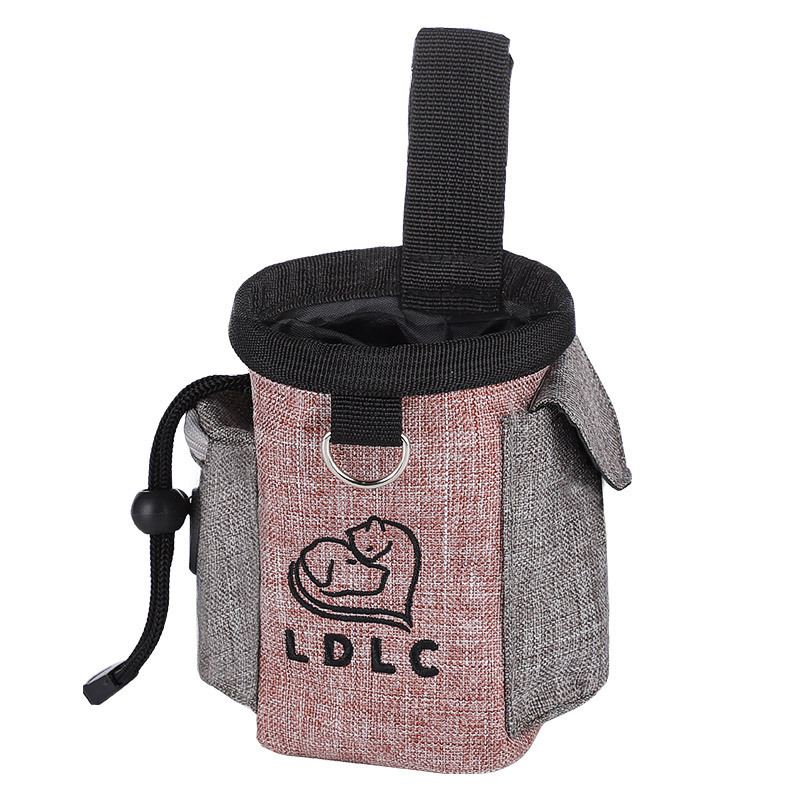 Always be prepared while on walks or on-the-go with this portable dog treats pouch. It is a small and convenient accessory used to store dry dog treats while training or walking. It is made of durable, polyester material and has a secure drawstring closure. The pouch can be attached to a belt or waistband, allowing pet owners to keep their hands free while still having the treats readily available.