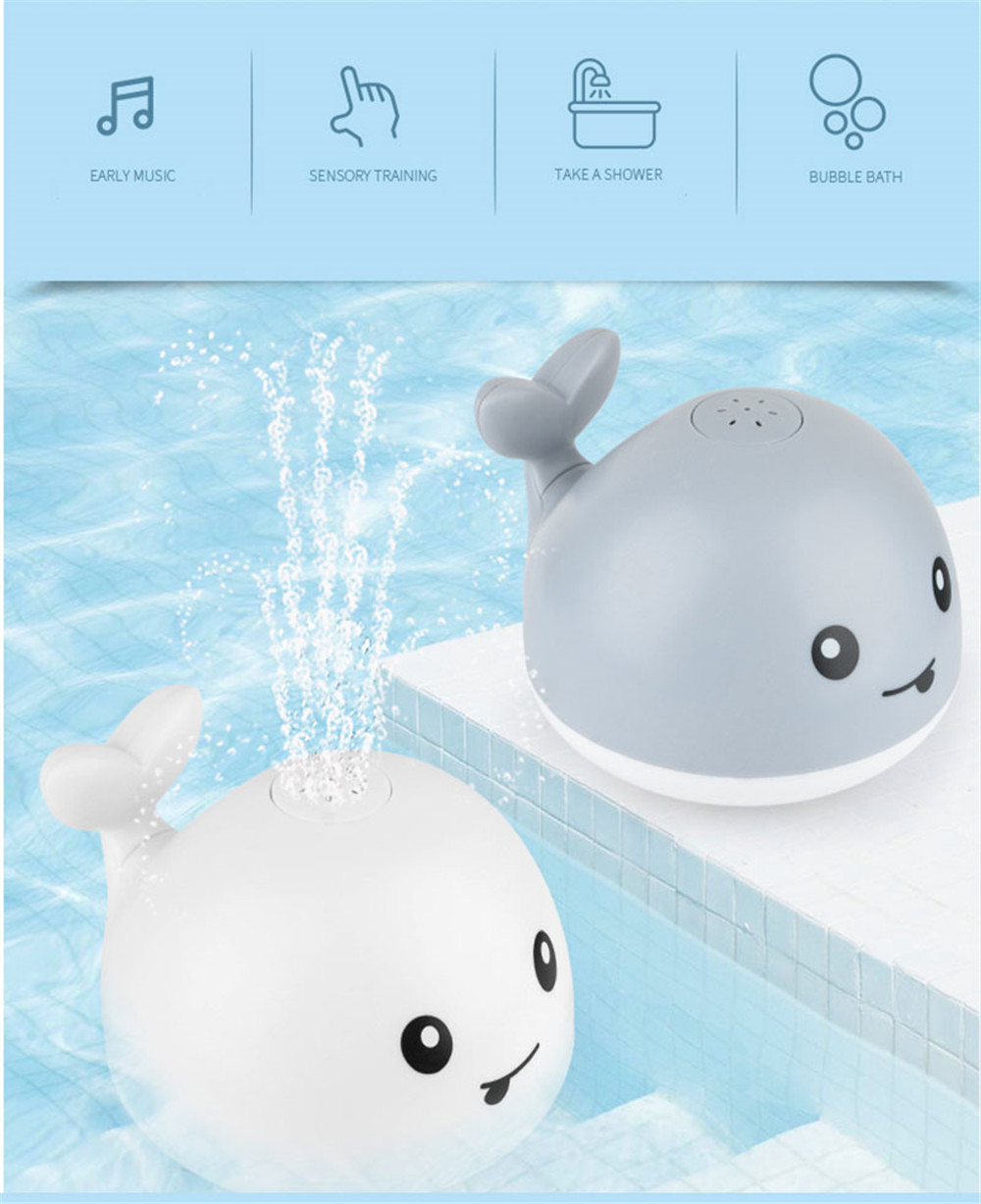  "Child Playing with Interactive Whale Faucet"
