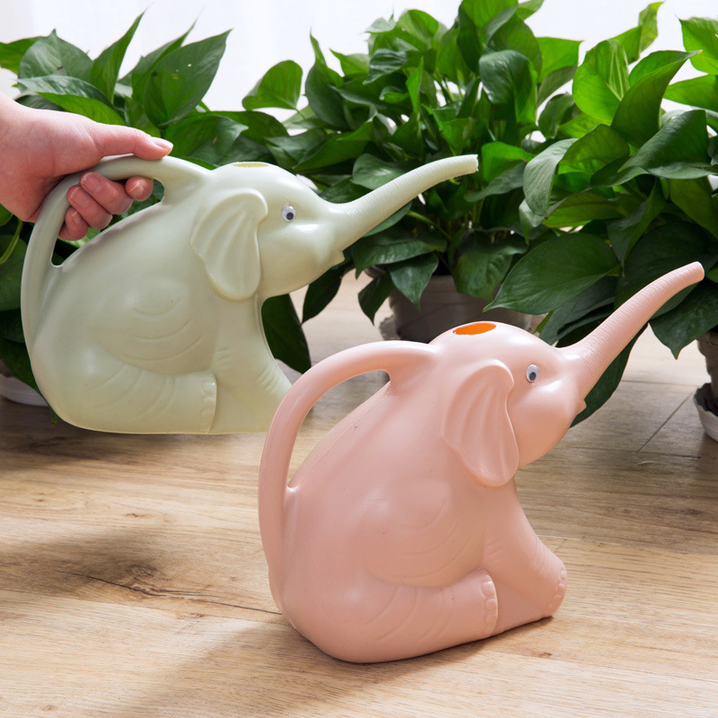 Baby Elephant Watering Flowers With LongMouth Watering Can