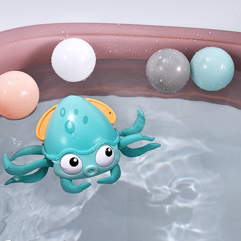  "Colorful Octopus Bath Toy floating in a bathtub"