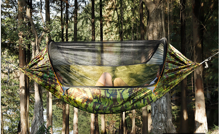 This roomy outdoor swinging hammock is perfect for laying around a lake or at the campground, with the anti-mosquito covering you'll not have to worry about pesky bugs biting you while you relax with a book or take a lazy after noon nap.