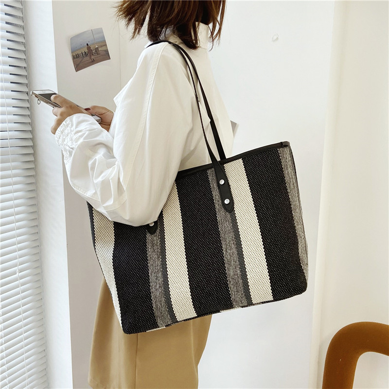 1f50b45a 31c2 43ca a825 8641f8640bff - Fabric Stitching Vertical Stripes Hit Color Tote Bag Shoulder Bag