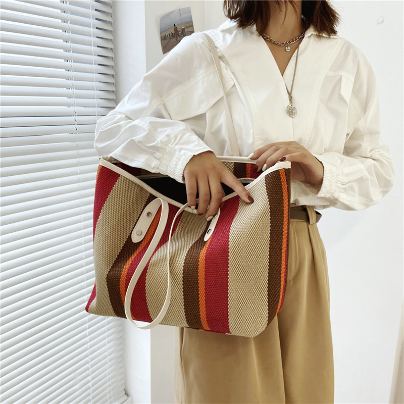 1fd20c94 1bf7 4813 a4b3 18651503b649 - Fabric Stitching Vertical Stripes Hit Color Tote Bag Shoulder Bag