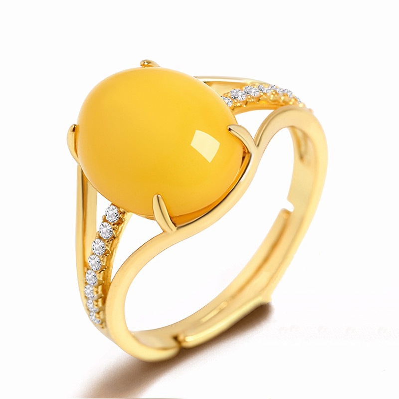 Gold-plated ring with yellow stones