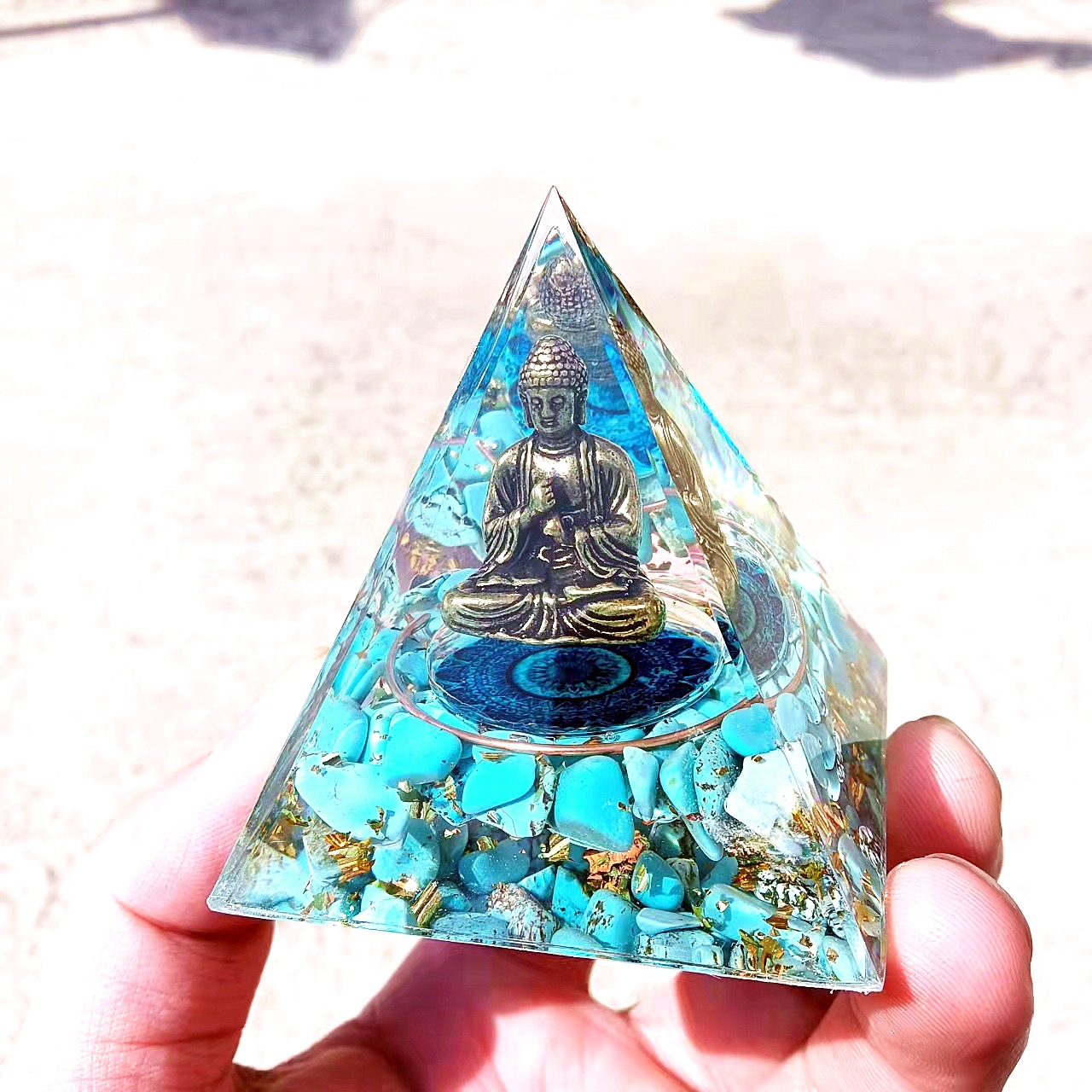Orgonite is based on two principles. It is a mix of resin (organic, as it is based on petrochemicals), and metal shavings (inorganic). A quartz crystal is also added because of its piezoelectric properties, which means that it gives off a charge when it is put under pressure (resin shrinks when it is cured, so constant pressure is put on the quartz crystal).