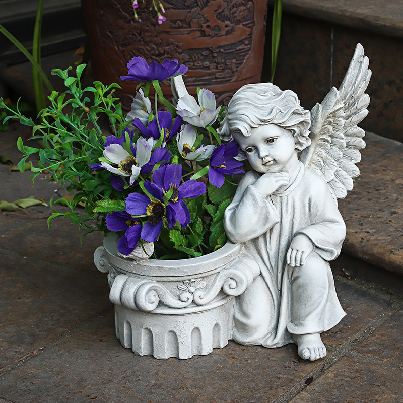 Statue ange jardin pot de fleur
