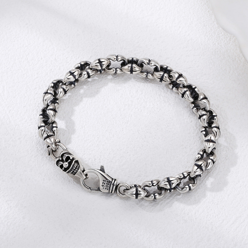 Retro style thick silver bracelet with totem elements