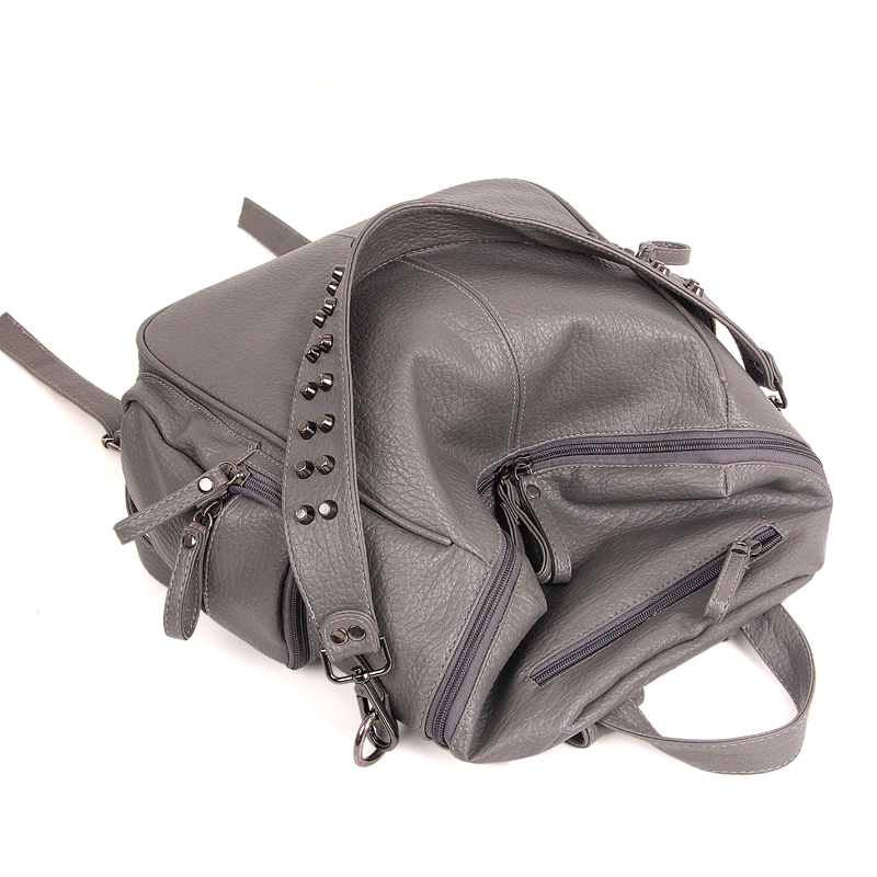 53f8e1ed ce08 41e2 8443 0c37eb220bb6 - Lightweight And Multifunctional Washed Leather Rivet Backpack