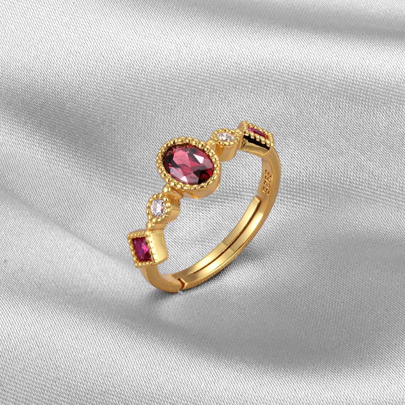 Elegant Ring with Red Gemstone Detail