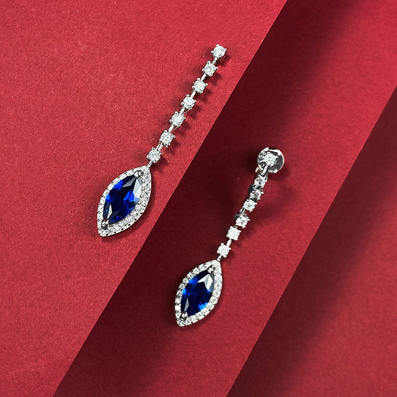 Sterling Silver Earrings featuring Synthetic Sapphire