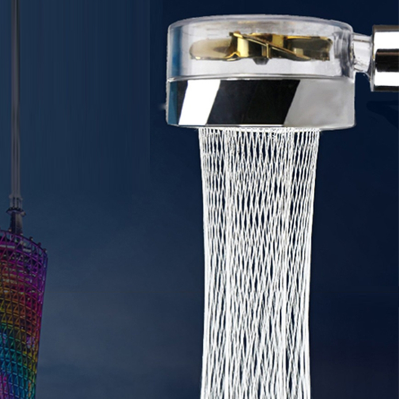 Chrome shower head with 360-degree rotation and built-in turbofan for a powerful and refreshing shower experience.