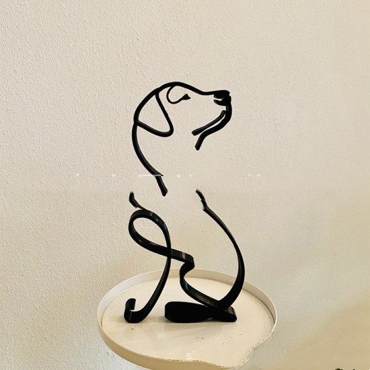 With its sleek and modern design, this dog minimalist art sculpture adds a touch of sophistication to any room, while also serving as a beautiful representation of man's best friend. The iron sculpture is characterized by clean lines, simple forms, and a focus on the essentials, creating a minimalist and abstract representation of a dog.