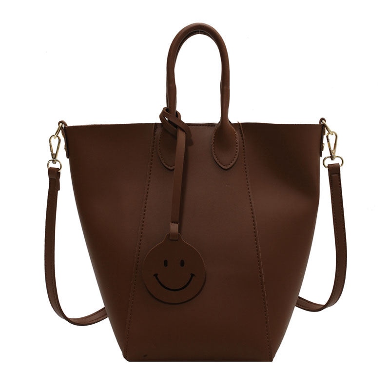 81c2c9b3 1c03 4591 9e8e 1fad02c5dafc - Solid Color Tote Bag With Smiley Face Pendant And Mother-In-Law Shoulder Bag