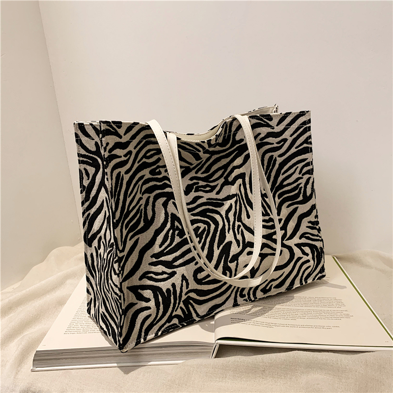88471429 d6a0 46e9 8304 c064a6cd4732 New Korean Women's Zebra Pattern Bag