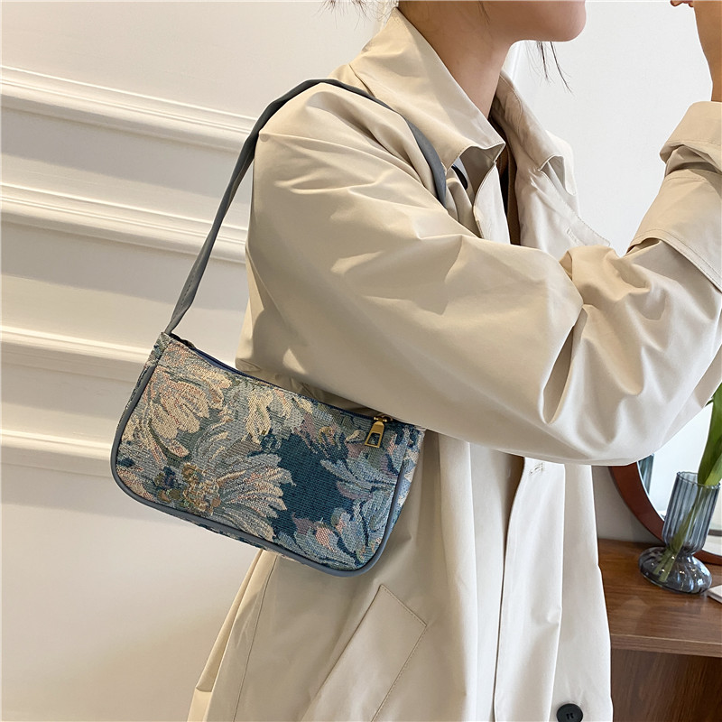 9d48ca84 6515 460a 9673 21a9b03bec15 - Fashionable And Colorful Oil Painting Flower Pattern Material Stitching Shoulder Bag