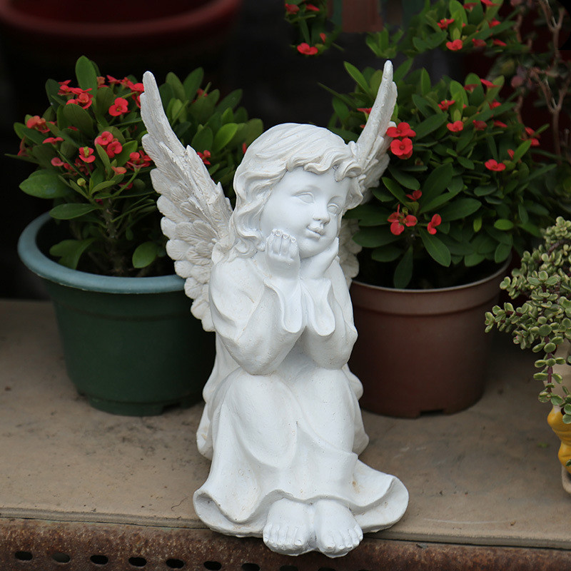 Statue ange jardin blanche