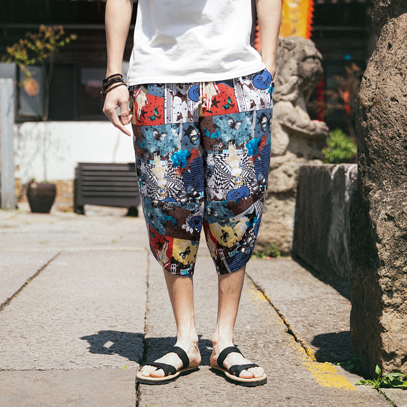 a person standing on a sidewalk