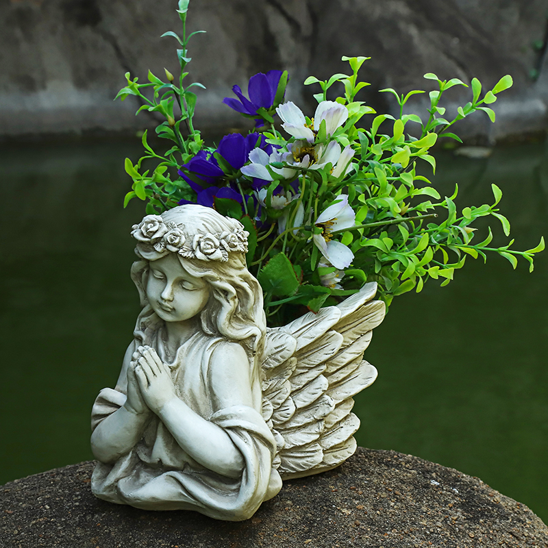 Statue ange jardin pot de fleurs