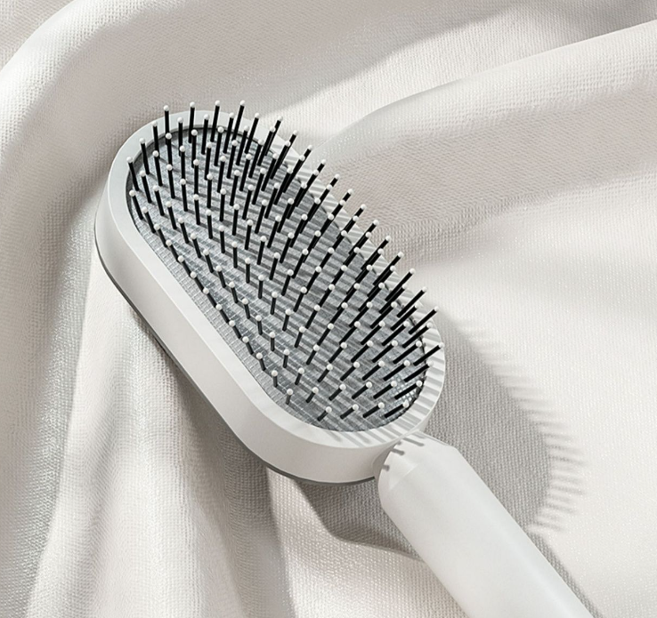 Självrengörande hårborste för kvinnor