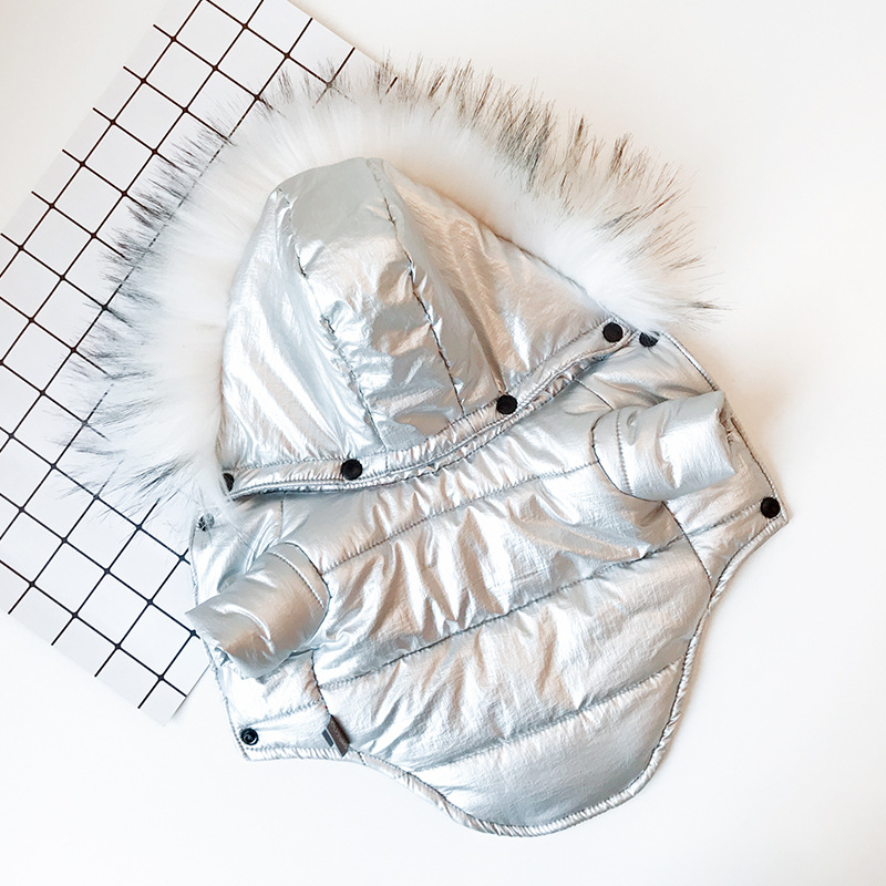 Make sure your dog is ready for cold winter weather with this stylish puffer jacket! Small dogs and older dogs benefit from extra insulation during the colder months, as they have a harder time retaining body heat. This puffer-style, cotton coat is a perfect addition to any dog's wardrobe!
