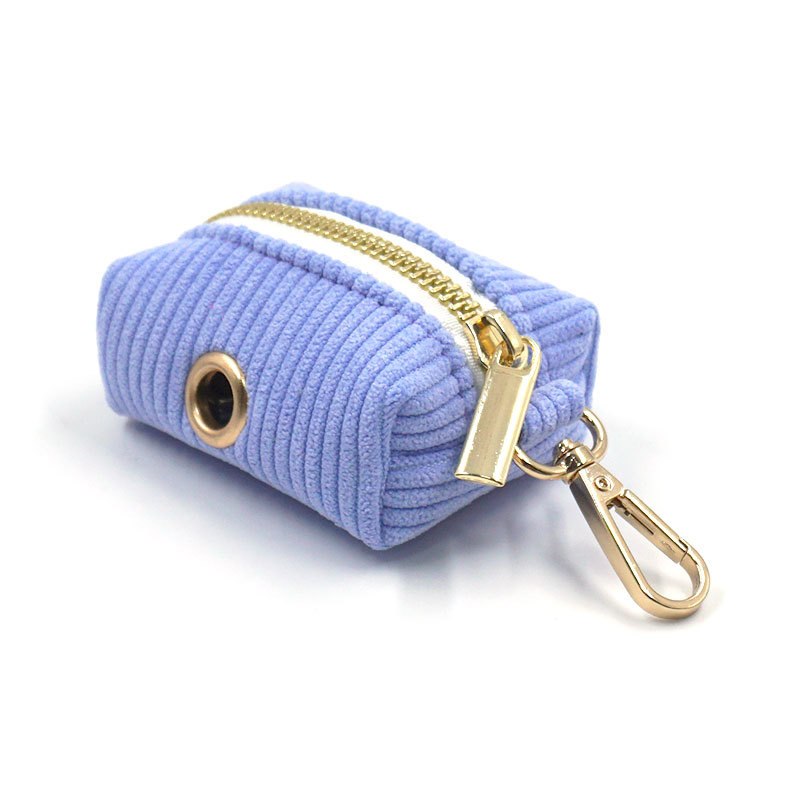 This corduroy dog poop bag holder is a convenient accessory for pet owners who want to keep their hands free during dog walks while ensuring proper disposal of their dog's waste.