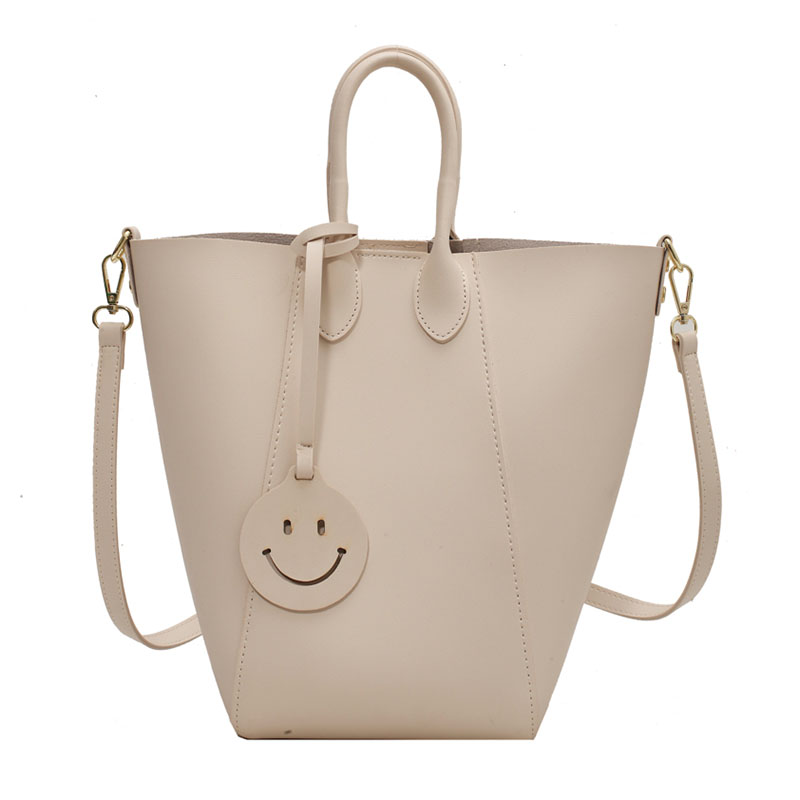daf34121 0737 478e 8d5f 78050d835eb0 - Solid Color Tote Bag With Smiley Face Pendant And Mother-In-Law Shoulder Bag