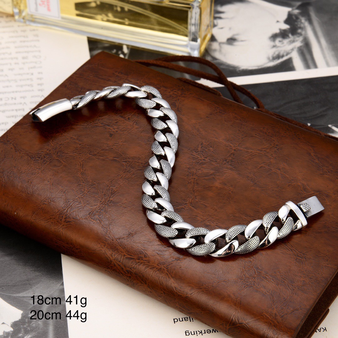 "Silver Cuban Link Chain with Snake Pattern - Detailed View"