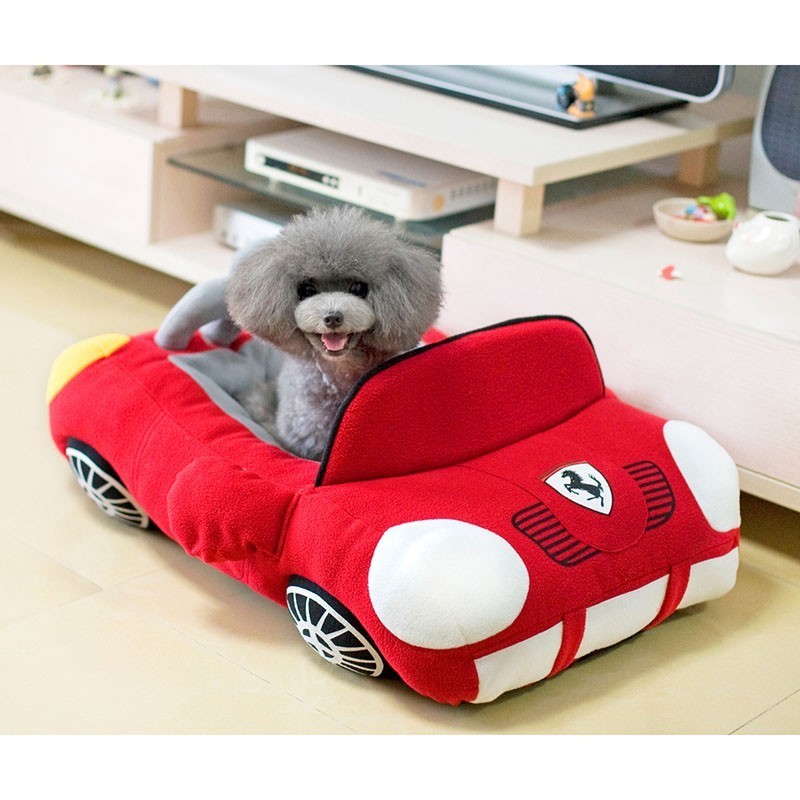 This Luxury K-9 Car Bed is a unique bed designed for dogs that combines a love for luxury cars and comfort for their pets. It's shaped like a fancy car and provides a cozy place for dogs to sleep while also bringing a touch of fun and personality to their space.
