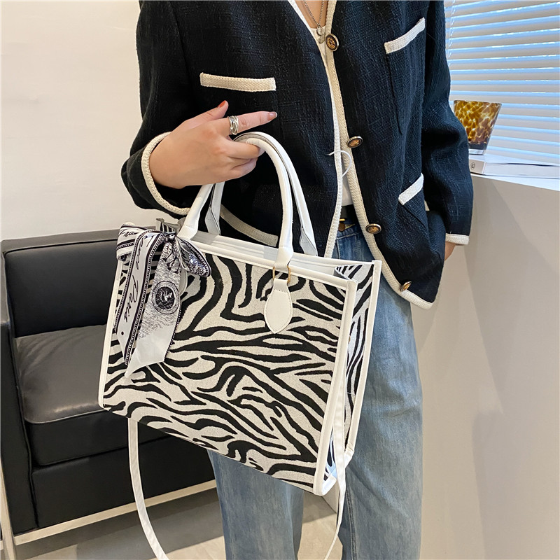 ea3b5f56 9288 44c1 b839 2323080c51d9 - Autumn And Winter Large-Capacity Zebra Print Silk Scarf Decoration Handbag