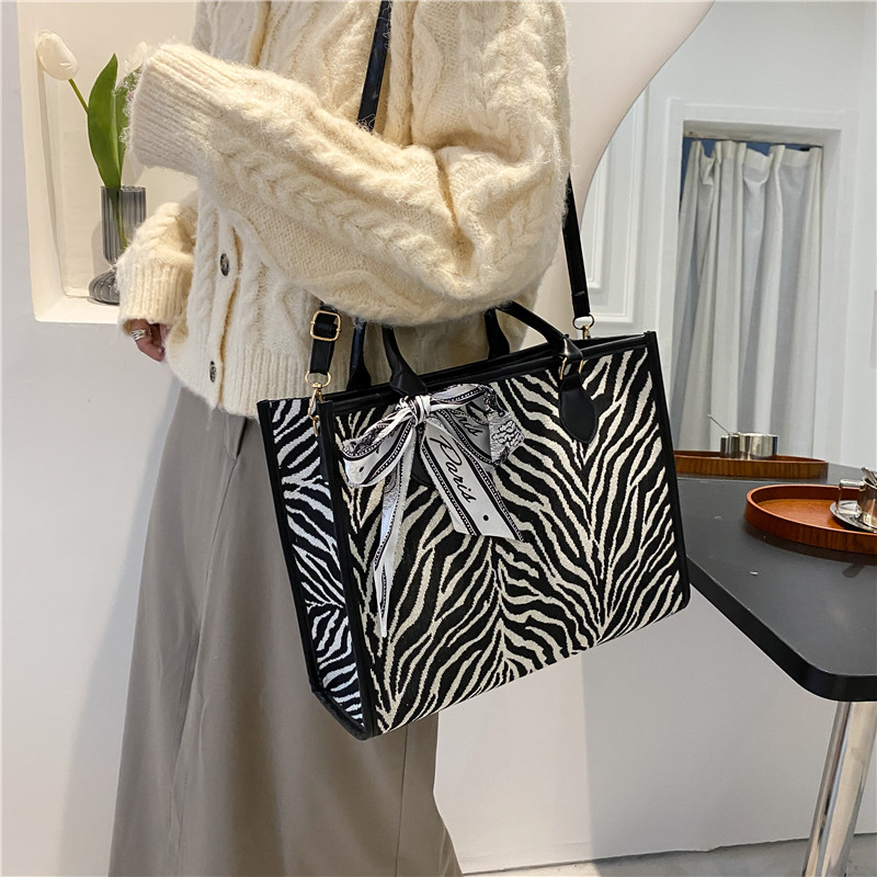 ed3ba11d 4c20 48f8 9983 d69c0f76298e - Autumn And Winter Large-Capacity Zebra Print Silk Scarf Decoration Handbag