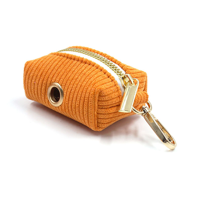 This corduroy dog poop bag holder is a convenient accessory for pet owners who want to keep their hands free during dog walks while ensuring proper disposal of their dog's waste.