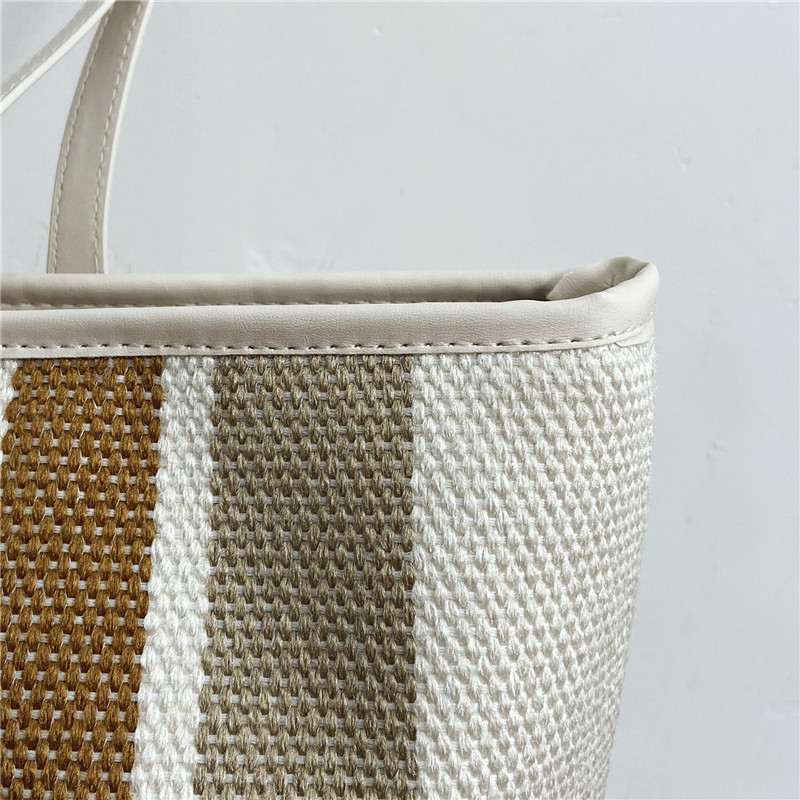 f0e9378e 9bd1 4f96 90b9 4a61bd0ebed0 - Fabric Stitching Vertical Stripes Hit Color Tote Bag Shoulder Bag