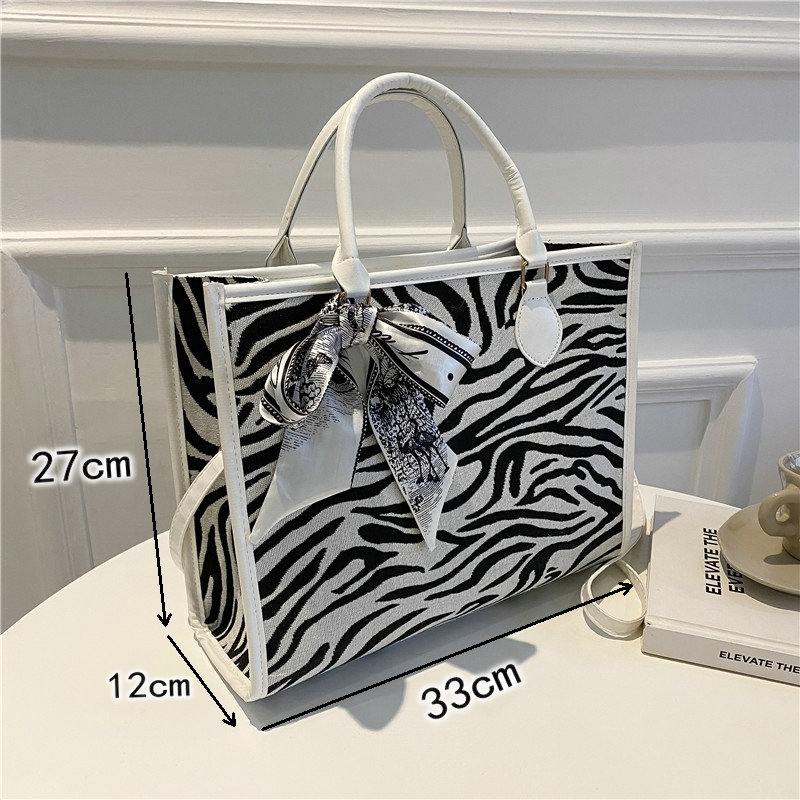 f3725e48 eec0 4f32 b970 992202829200 - Autumn And Winter Large-Capacity Zebra Print Silk Scarf Decoration Handbag