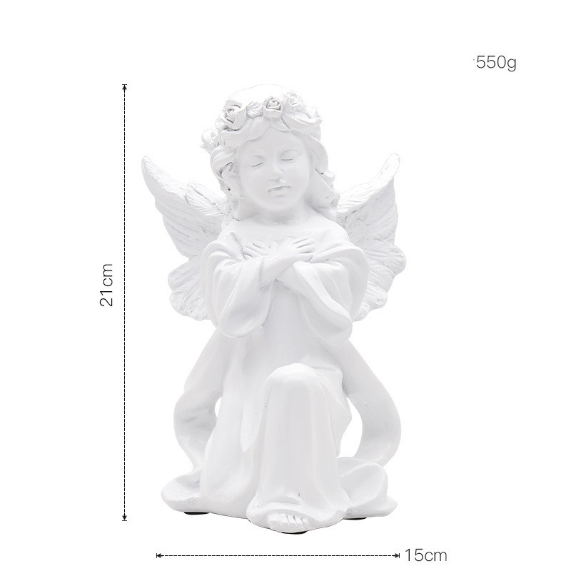 Statue ange à genou
